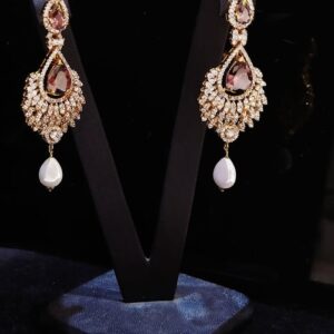 Gold Pated Earrings with premium quality Zircons and hanging Pearls.
