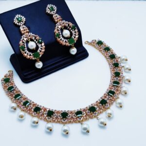Gold Plated Necklace Set With jade champion Zircons and hanging Pearls.