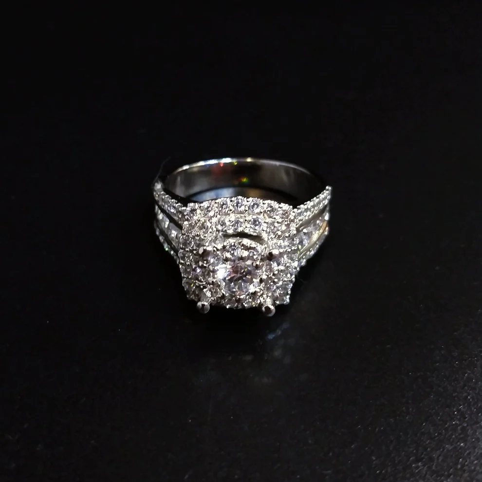 Diamond cut solitaire ring with white gold plated