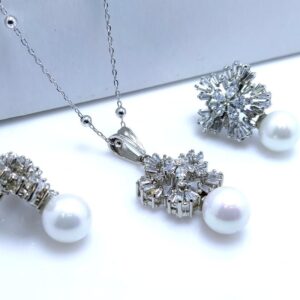 Pendant set With Tapered cut zircons & Pearls White Gold plated.