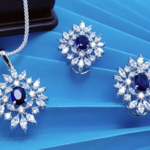 Rhodium Plated Pendant set with Blue Sapphire and Zircons.(925 Silver)