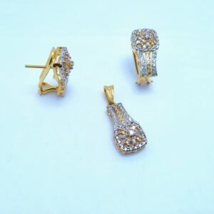 silver pendant set with zircons and gold plated.