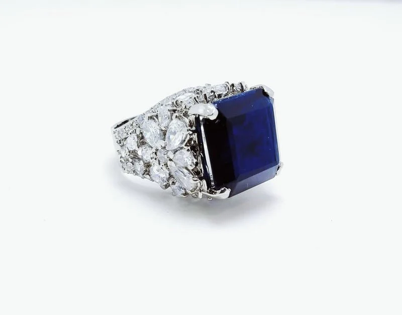 Rhodium Plated Ring with Zircon and Synthetic Blue Sapphire. (925 Silver)